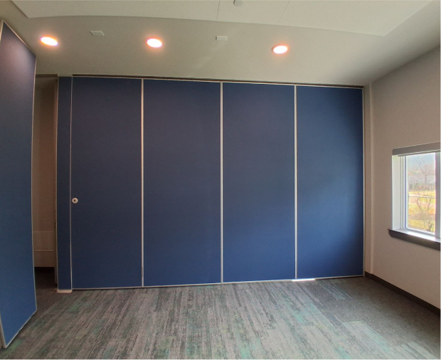 Blue sliding panels in a modern room.